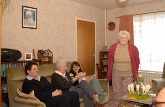 Hilda Black (standing), Naw-Rúz, 2003 Seated on sofa, left to right: Alison Shaw, Tim Zaprjalski (also known as Tim Hubbard, now deceased) and Sophie Cox